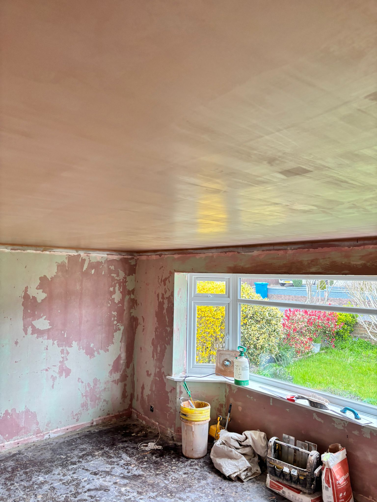 Smooth finished plaster ceiling ready for painting